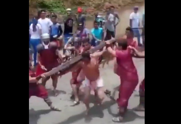 Funny Video of Jesus Fighting Attackers While Carrying the Torture Stake